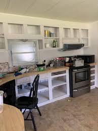 Mobile home cabinets are not solid wood, but a mix of composite materials that include particleboard and plastic veneer. Mobile Home Remodel Before And After Our Re Purposed Home