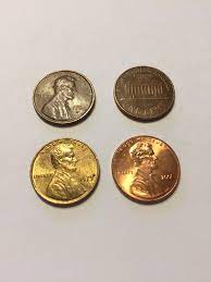Place the silver penny on a hot plate heated to about 570°f (300°c). Doing Some Crh Why Is This This Penny Gold Colored Coins
