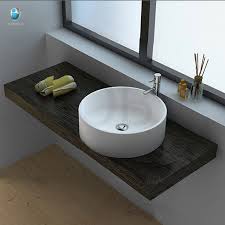 white mother of pearl round sink/ above