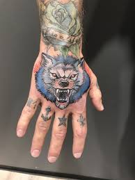 My Neo Traditional Blue Wolf Hand Tattoo Hand Tattoos Hand And Finger Tattoos Traditional Tattoo