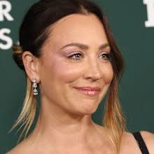 Brittany Mahomes Rocks White Shirt and Denim While Kissing Patrick Mahomes  at Chiefs Game