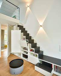 Space Saving New Ideas Combine Storage With The Staircase Under Stairs Storage Solutions Stair Storage Understairs Storage