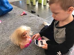 Little Greyson playing with my hair