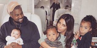 News that kim kardashian and kanye west are expecting another baby via surrogate. Kim Kardashian Snuggles In Bed With Her And Kanye West S Three Kids