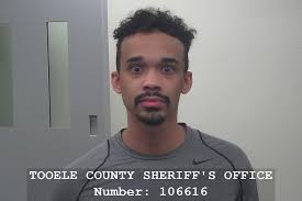 Utah man charged after claiming he went to 'document' riot