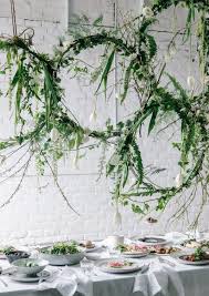 With this wedding centerpiece idea, you can bring your rustic look to life with candles, string and greens. Breathtaking Hanging Centerpieces To Upgrade Your Wedding Tablescape Mywedding