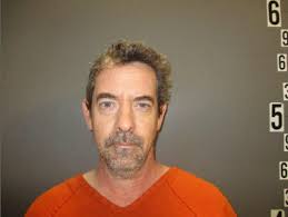 I clean the stadium in york and found a debit card with the name Michael  fauth and a wallet with 15 dollars and the ID read andrew j adams please  contact me