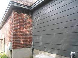 Red brick home with cream colored siding and black shutters with a red brick driveway. 64 Exterior Paint Colors With Brown Brick Red Brick House Exterior Exterior Paint Colors For House Brick Exterior House