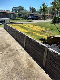 Ridgi Rocks Concrete Sleeper Steel Post Retaining Wall Available At Bunnings Warehouse For More Informa Garden Fencing Fence Design Backyard Retaining Walls