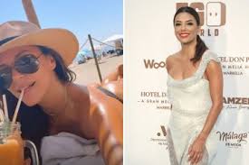 Eva Longoria wows in a bright orange dress during night out in Hollywood