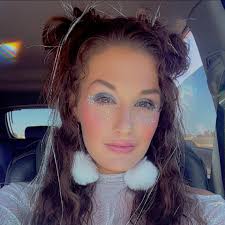 Who can do a color correction for blonde and red highlights in the Loveland  area?