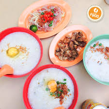 Porridge Fanatic Whenever You Visit Singapore Do Drop By Chinatown To Try The Fried Intestines Porridge Raw Fish Century Egg Porridge Hearty Meals Eat Food