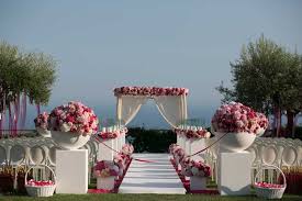 First, choose an outdoor wedding location with unique features. Florist For Weddings In Italy Floral Decorations Wedding Italy Flowers Exclusive Italy Weddings