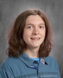 Can someone remove the stretch tag from my son's shirt?