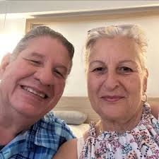 Which island near Athens is recommended for a two-night trip in July?