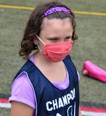 Field hockey in the mist at Champions Stadium