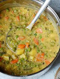 This Hearty Veggie Stew Contains Green Peas Potatoes Carrots And Other Healthy Vegetables T Veggie Stew Recipes Vegan Vegetable Soup Vegetable Soup Healthy