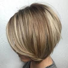 Contrasts always grab attention, so go for a sandy brown or blonde top layer that will. 29 Brown Hair With Blonde Highlights Looks And Ideas Southern Living