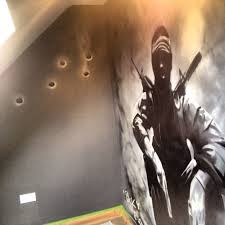 In A Kids Little Snug Games Room Call Of Duty Theme Bullet Holes Aren T Really Real They Where Sprayed On By Me Game Room Family Gamer Room Kids Bedroom Boys
