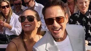 Robert Downey Jr. makes a rare public appearance with his stylish wife  Susan as they have fun while sitting FROW at the Stella McCartney PFW show 
