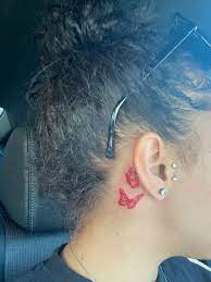 That is why many women choose a butterfly to represent. Butterfly Tattoo Neck Tattoos Women Red Ink Tattoos Behind Ear Tattoos