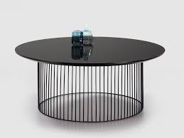 The 24 by 47 table features a rectangular glass top with an additional bottom glass shelf for extra space. Idra Coffee Table Idra Collection By Kendo Mobiliario Design Perezochando