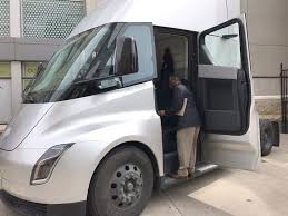 Overall styling, paint colors, pano roof, dash materials, seating, storage, console. Tesla Semi Truck S Rare Interior Pictures Emerge From Sacramento Ca Tesla Semi Truck Semi Trucks Interior Trucks