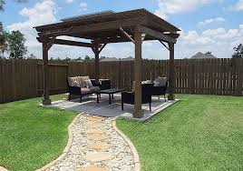 Use the shovel and rake to spread it evenly over the gravel. Flagstone And River Rock Path Leading To Pergola With Outdoor Furniture Pergola Patio Landscaping Pergola Patio