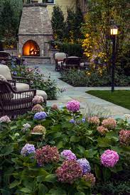 This is an example of a traditional garden in little rock with natural stone paving and a fireplace. 75 Beautiful Landscaping With A Fireplace Pictures Ideas June 2021 Houzz