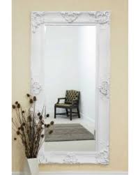 The beautifully carved wooden frame decorated with flowers and foliage. Mirroroutlet Uk S Leading Online Mirror Retailer