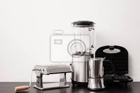 Family having fun with kitchen appliances cooking food for christmas at home. Set Of Kitchen Appliances On Table Near White Wall Leinwandbilder Bilder Holz Weiss Wand Myloview De
