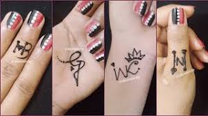 You can take some inspiration from this henna n letter tattoo design. 5 Beautiful T Letter Rings Design With Mehndi Stylish Elegant Finger Ring Jewellery Mehndi Design