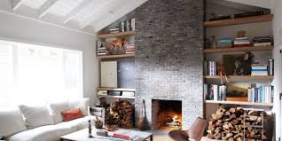 A dark gray wall paint can make an attractive design when paired with an exposed brick wall. Design Debate Is Exposed Brick For You