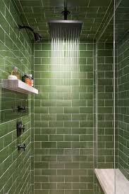 These Creative Bathrooms Prove The Power Of Blue And Green Tile Green Shower Tile Brown Tile Bathroom Custom Tile Shower