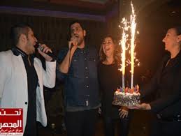 بالصور حفلة عيد ميلاد كارولين مشمل وطوني طويل في مطعم حياتي موقع عربي أمريكي
