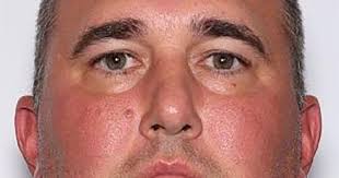 A high school football coach wanted for child pornography offenses has been  missing for over a month. Here's what we know