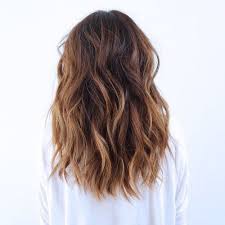If you think that your curly hair won't be manageable when you have short hairstyle, try this tapered short haircut. Hairdeas