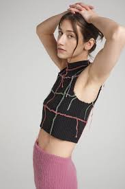 Model is 5'7 and wears a. Unfazed Knit Black The Ragged Priest