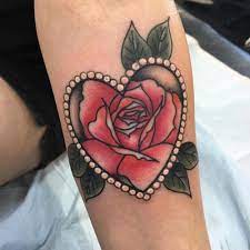 A tattoo of a rose and/or a heart is a very popular and attractive design. Yourtattooisbad Rose Tattoos Tattoos Traditional Heart Tattoos