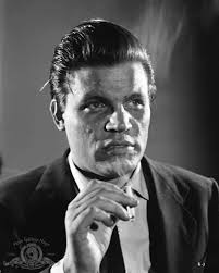 Neville Brand was a unique character actor with a gravelly voice who served  in the United States Army during World War II.