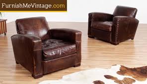 Features a modern design made from steel with leather strapped drawers. Pair Of Pre Owned Restoration Hardware Leather Club Chairs
