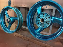 We take the factory wheel, strip, prepare and polish the wheel, then apply a five layer compound process. Powder Coating Car Wheels Alloy Wheel Paint Cost Tpc