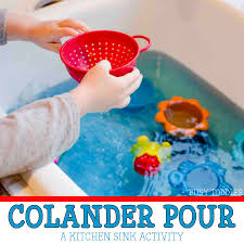 Learn how to choose a kitchen sink in our guide. Colander Pour In The Kitchen Sink Busy Toddler