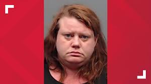 Officials arrest woman accused of driving suspect vehicle connected to  Smith County murder