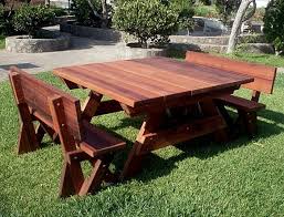 Large cedar trestle style table for outdoor dining. Square Heritage Large Wooden Picnic Table