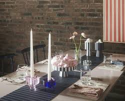 Set your table with table runners in classic colors and bright patterns. Table Runner Black Burke Decor