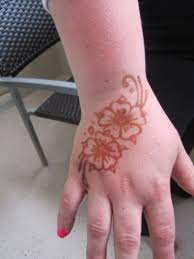 A henna tattoo, also known as mehndi body art, is a temporary and painless stain applied to the skin using henna paste. Jacksonville Fl Henna Tattoo Tattoos Henna Tattoo Flower Tattoo