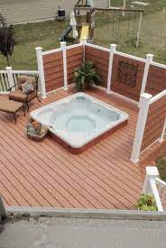 This gave her some extra privacy at the top of her fence where her neighbors could possibly see over. 40 Adorable Wooden Privacy Fence Patio Backyard Landscaping Ideas Homedecorish Hot Tub Outdoor Hot Tub Backyard Hot Tub Privacy