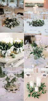 A series of simple green vases filled with white flowers is an enchanting vision. 12 Simple White And Green Wedding Centerpieces On A Budget Emmalovesweddings