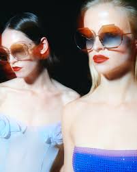 Captured through a hazy lens for dreamlike allure the Margot sunglasses is  a study in contrasts. A hexagonal silhouette sculpted in pure Japanese  22-carat gold-plated titanium, partially wrapped in sculpted acetate and
